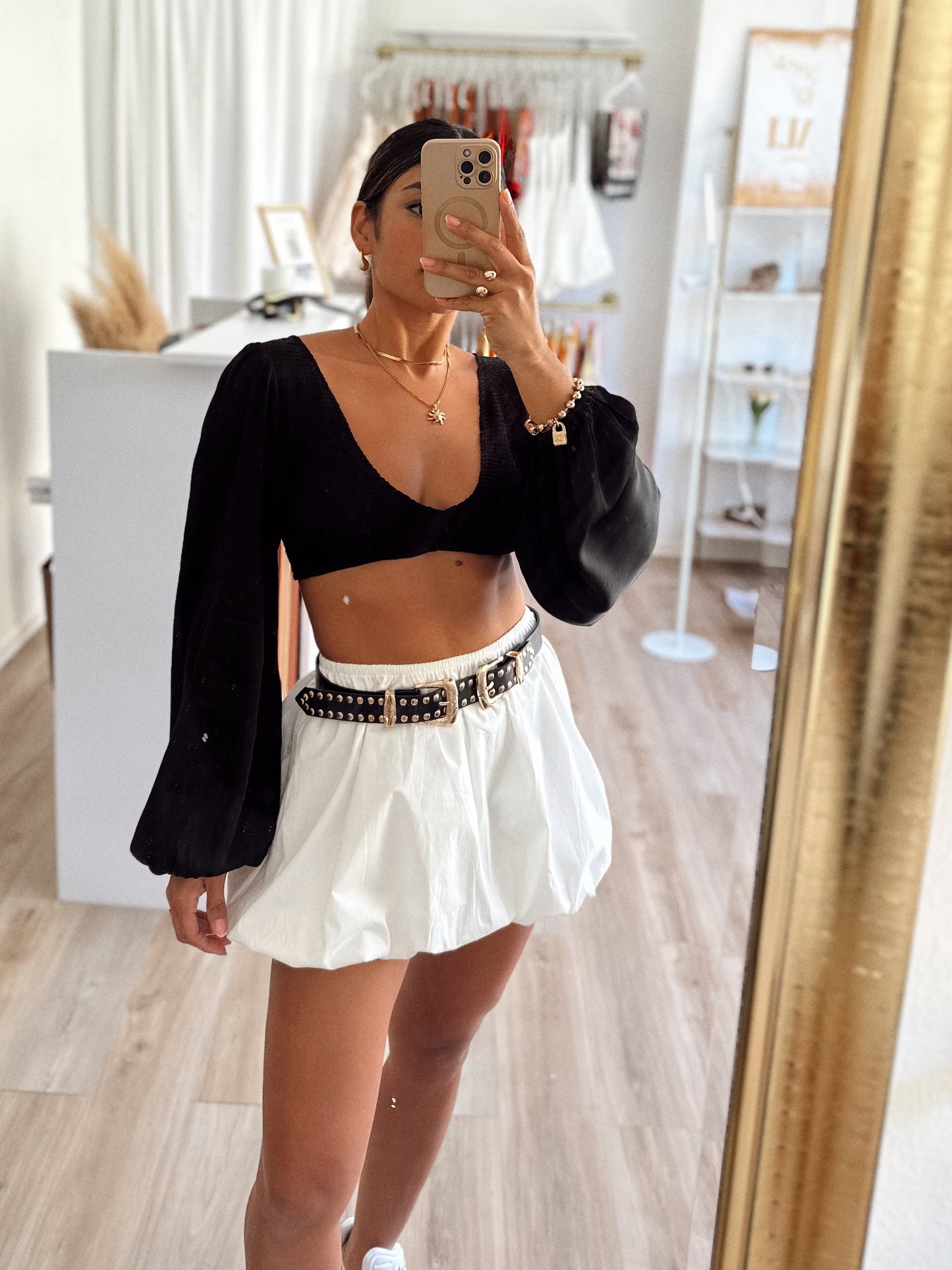 The black puff sleeve top
