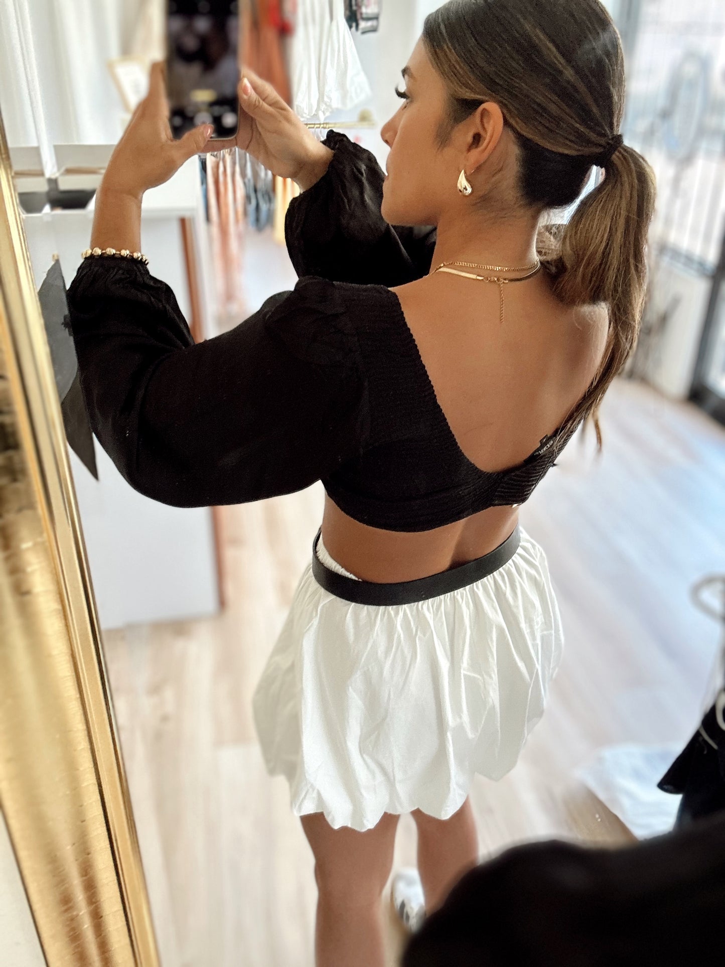 The black puff sleeve top