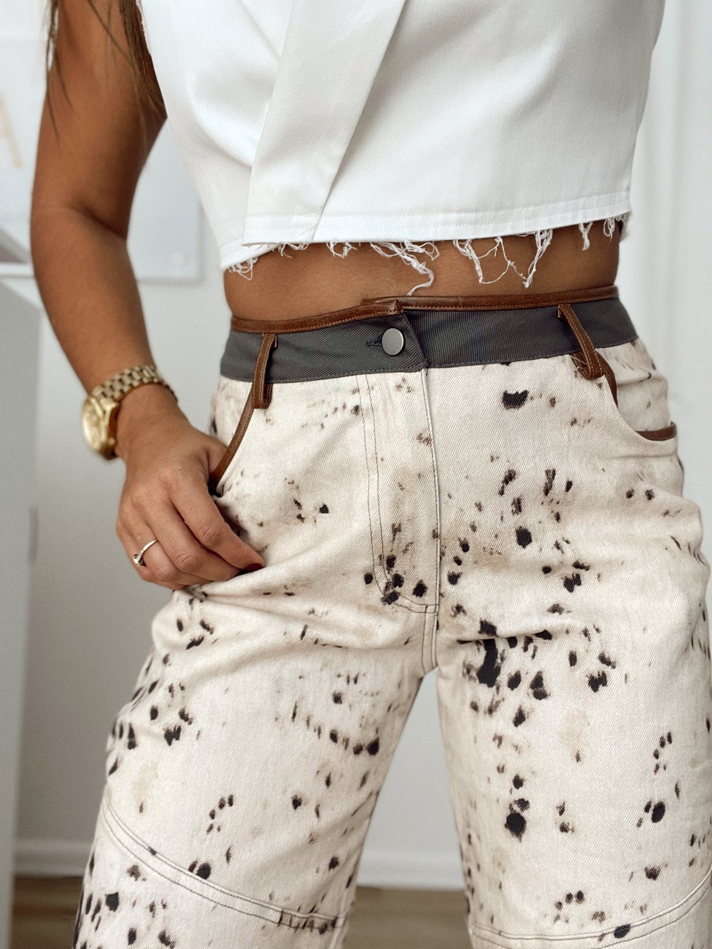 Cow x leather detail denim