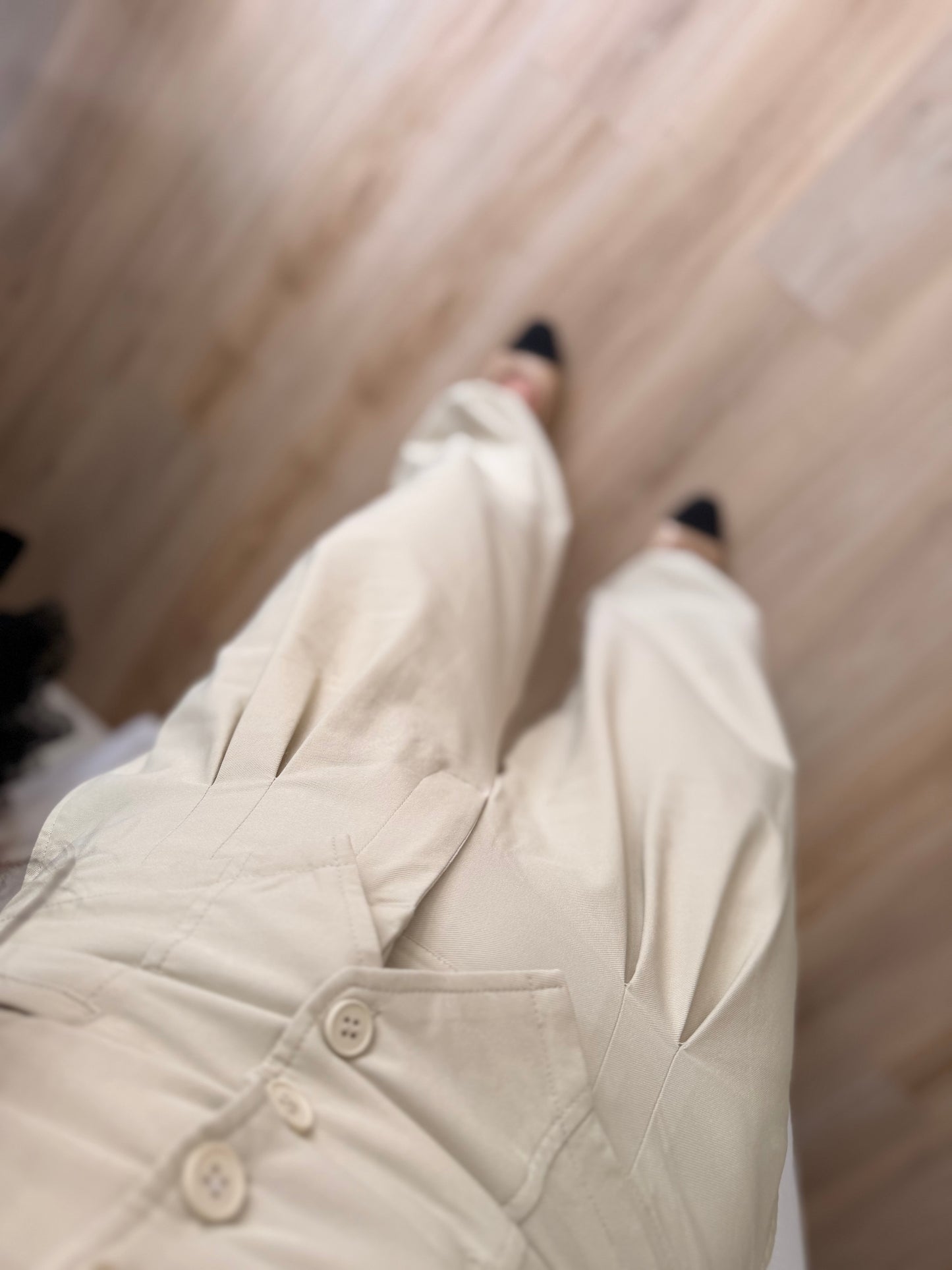 The taupe tailored trousers or balloon pants
