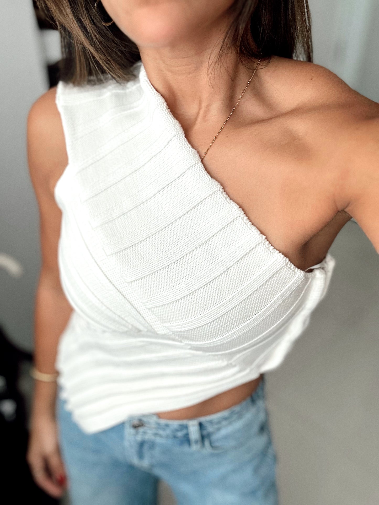 Asymmetrical bone white top