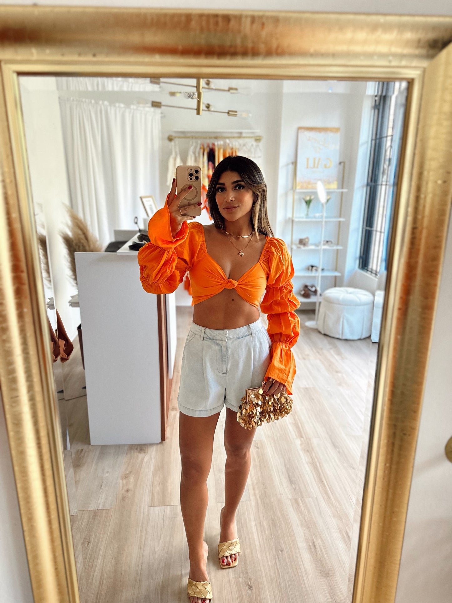 Bright orange top