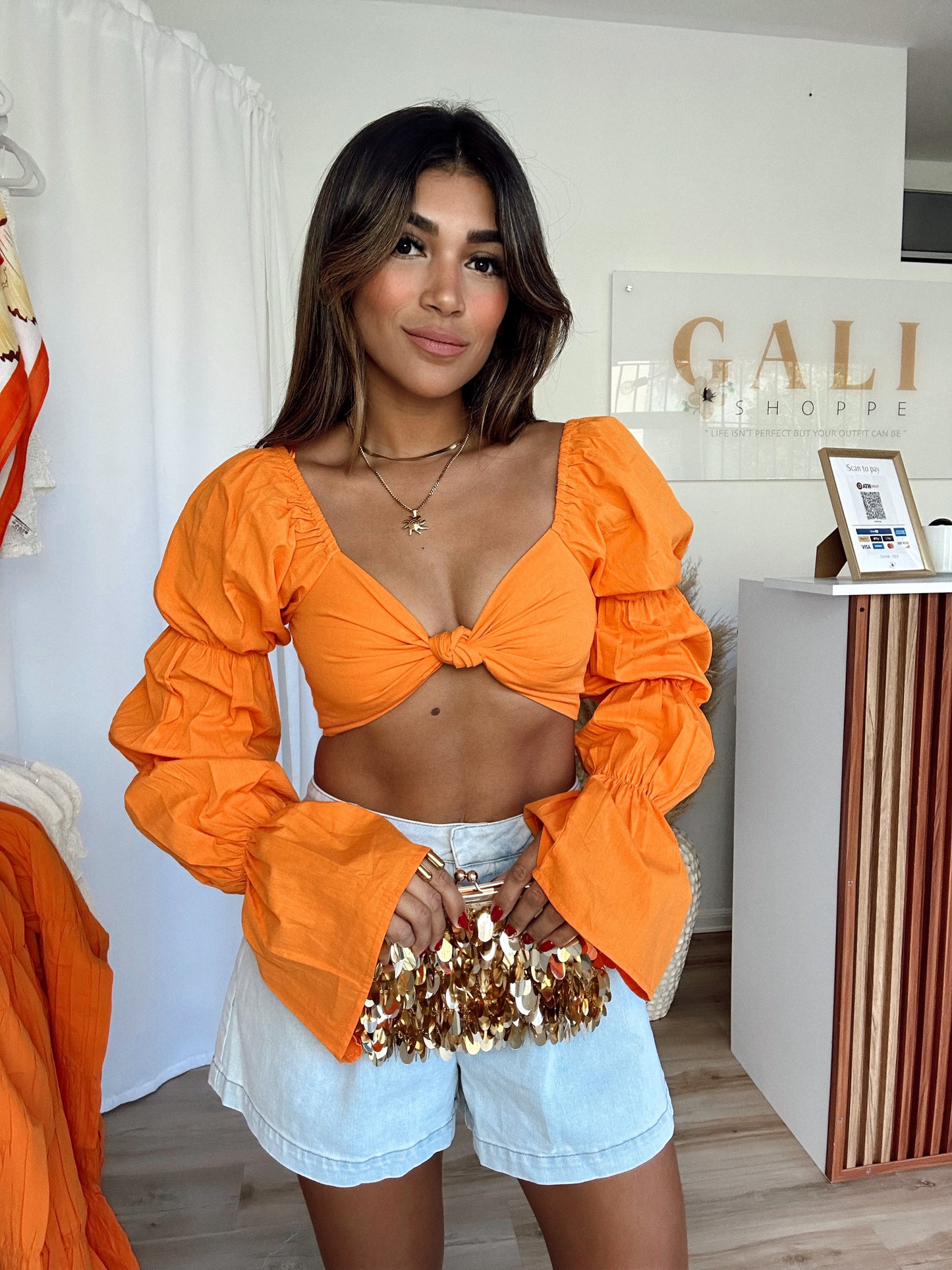 Bright orange top