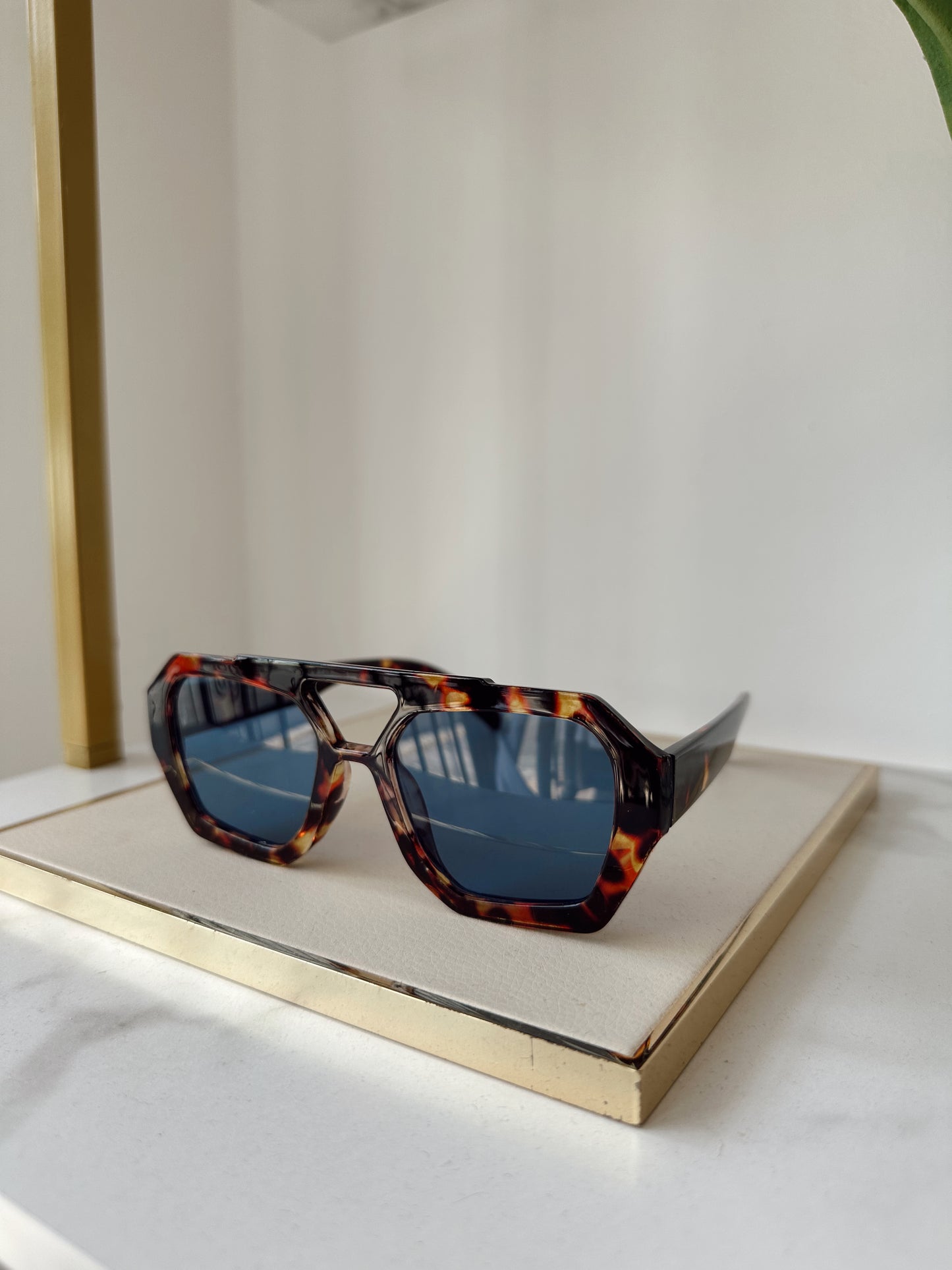 Tortoise x blue sunglasses
